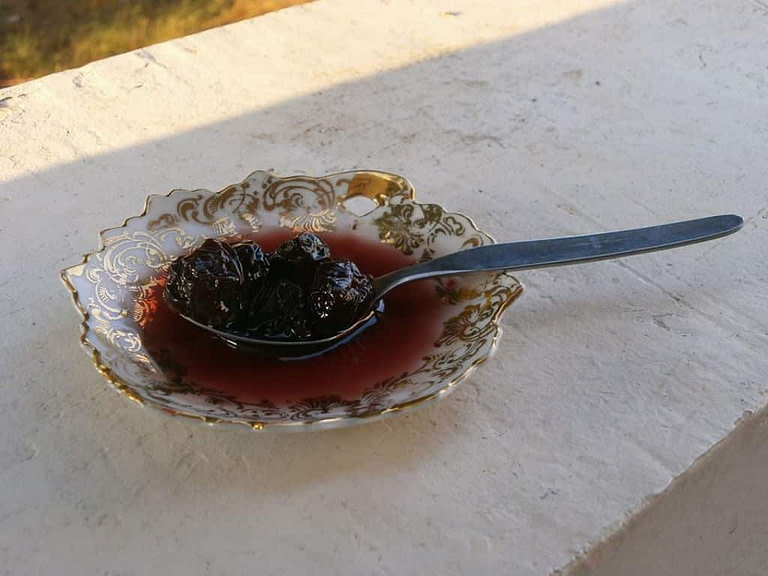 teaspoon with heights spoon sweet in small plate with syrup at 'Ta Glika tis Roxanis'