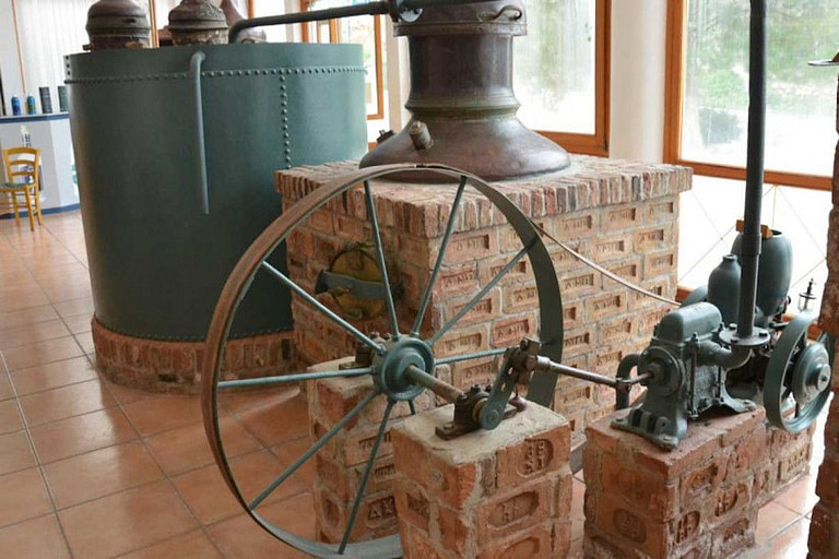 old manual copper distillery with wheel at Ouzo Barbayannis museum