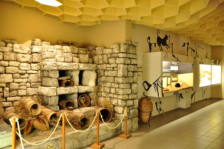 displays of old ceramic hives at 'Melissokomiki Dodekanisou Bee Museum'
