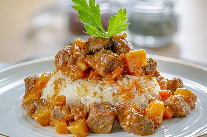 Close-up of ‘Tas kebab’, is the combination of special meat stew around and on top of pilaf